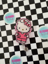 Load image into Gallery viewer, Pink Nurse Cat Character Retractable Badge Reel
