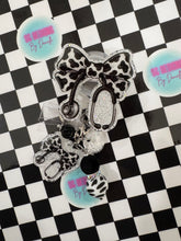 Load image into Gallery viewer, Cow Print Stethoscope Bow Retractable Badge Reel
