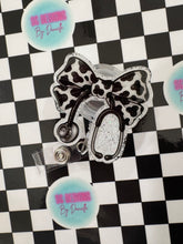 Load image into Gallery viewer, Cow Print Stethoscope Bow Retractable Badge Reel

