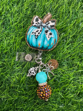 Load image into Gallery viewer, Teal Pumpkin With Cow Print Bow Retractable Badge Reel
