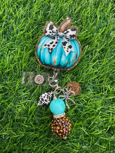 Teal Pumpkin With Cow Print Bow Retractable Badge Reel
