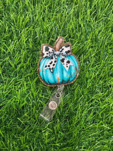 Teal Pumpkin With Cow Print Bow Retractable Badge Reel