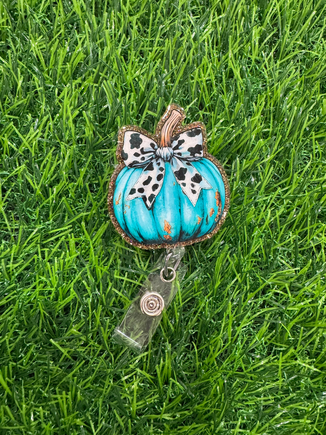 Teal Pumpkin With Cow Print Bow Retractable Badge Reel