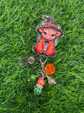 Load image into Gallery viewer, Fall Witch Highland Cow Retractable Badge Reel
