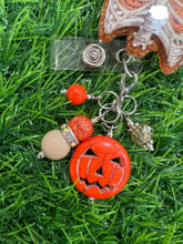 Load image into Gallery viewer, Pumpkin Ribcage Retractable Badge Reel
