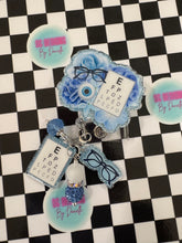Load image into Gallery viewer, Blue Floral Eye Chart Optometry Retractable Badge Reel
