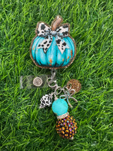 Load image into Gallery viewer, Teal Pumpkin With Cow Print Bow Retractable Badge Reel
