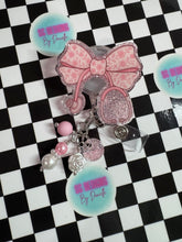 Load image into Gallery viewer, Pink Floral Stethoscope Bow Retractable Badge Reel

