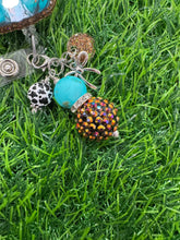 Load image into Gallery viewer, Teal Pumpkin With Cow Print Bow Retractable Badge Reel
